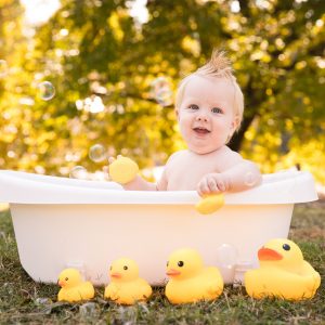 outdoor 1 year bubble bath in the park with rubber duckies